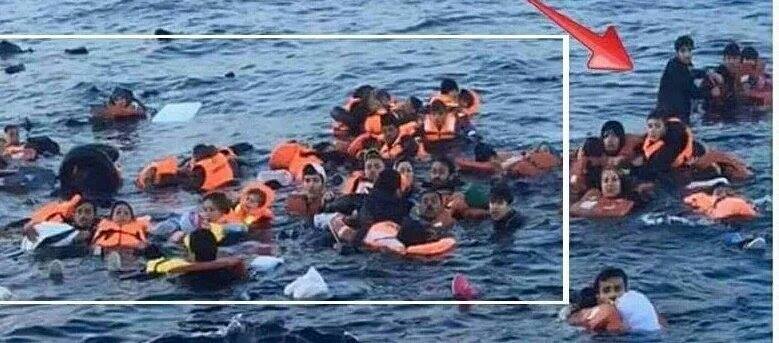 Whoops. Standing man ruins "drowning migrants" photo-op.